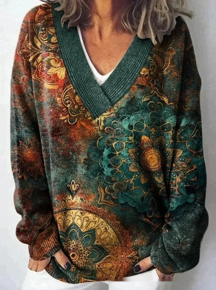 Women's V-neck floral print sweatshirt with long sleeves in wool woven fabric.