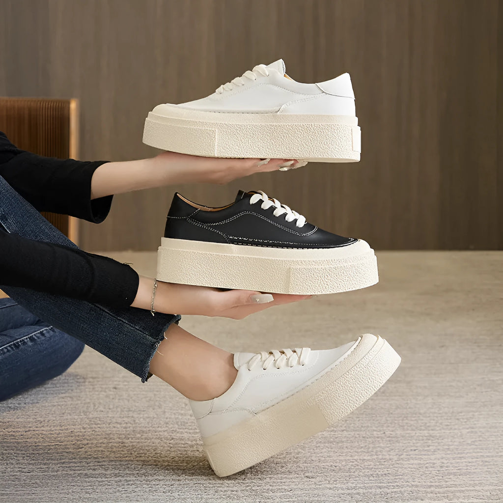 Women's black platform sports board shoes with embossed cowhide upper and tie fastening