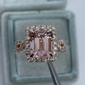 Rose gold electroplated alloy ring with geometrical design shown on hand
