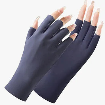 Thin beige women's sunscreen gloves with UPF50+ protection on a hand.