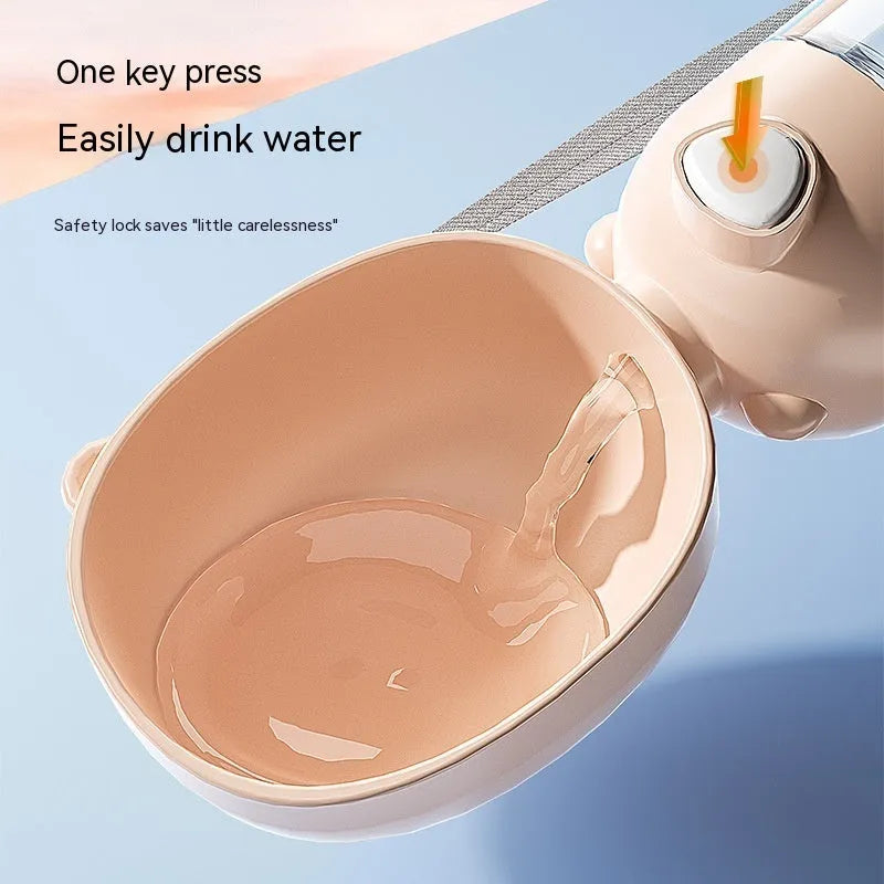 Portable dog water bottle with integrated food container in brown, pink, or yellow colours