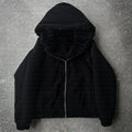 Casual baggy polyester coat in black or white with long sleeves and loose fit