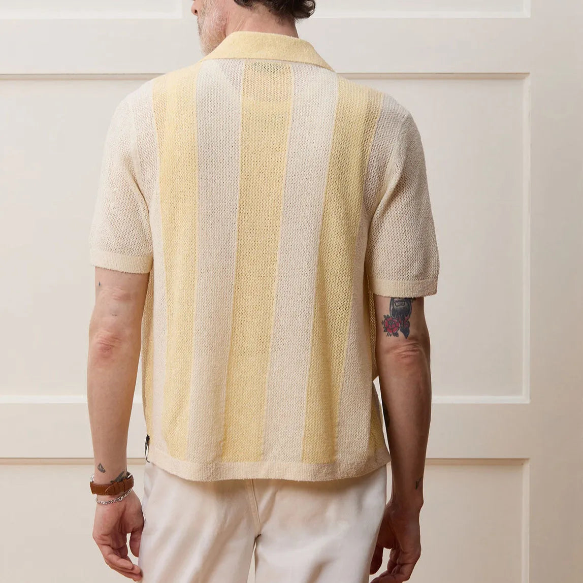 Yellow casual polo shirt with hollow-out design and asymmetric hem, short sleeves, Tencel fabric
