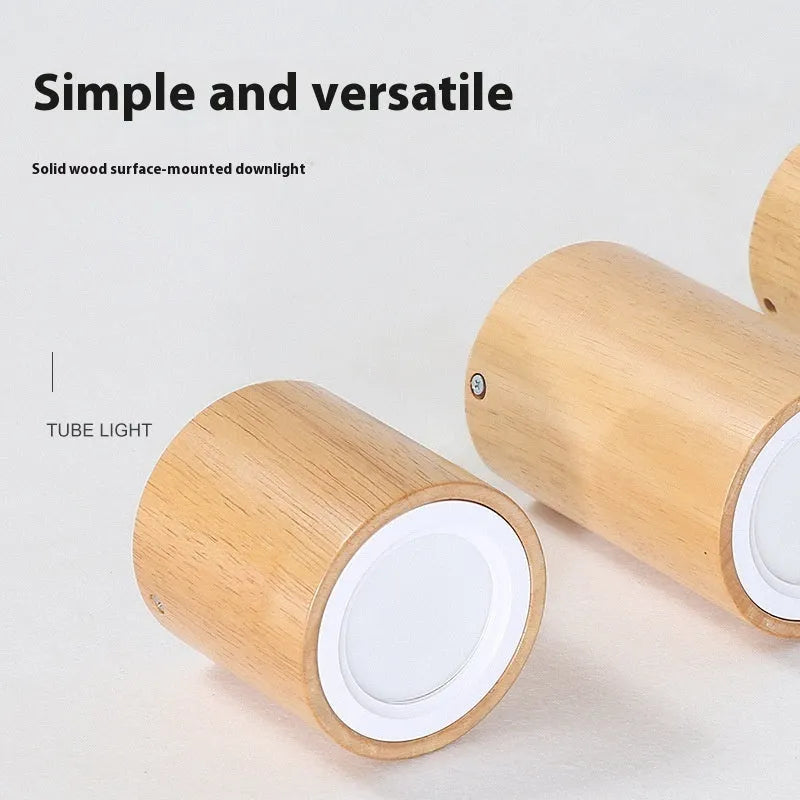 Solid wood surface mounted downlight in wood colour with square or round design options