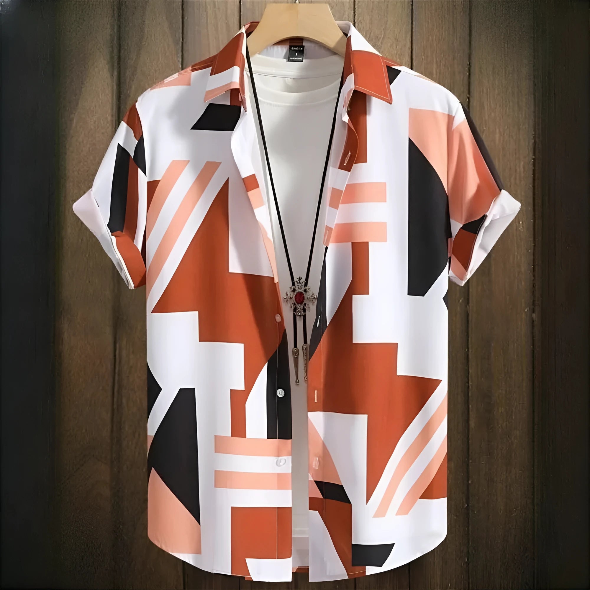 Men's loose fit grey camouflage print t-shirt with short sleeves on a white background.