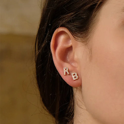 Gold plated English alphabet letter earrings with zircon stone accents on copper base