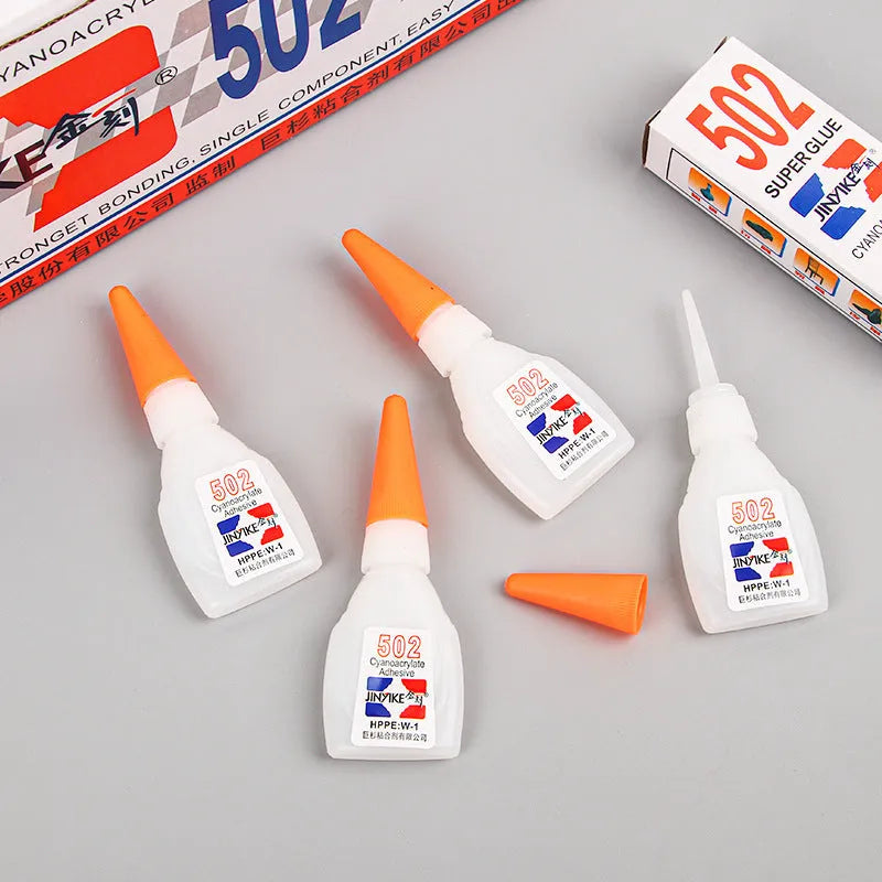 Instant strong shoe repair adhesive in 3G and 8G sizes with application tool