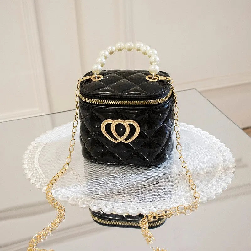 PVC bucket-shaped gel bag with a heart pattern, shown in one of seven available colours.