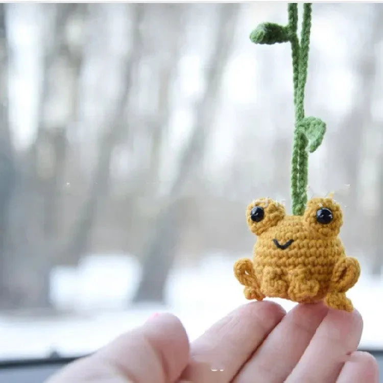 Handmade woven plush frog car pendant measuring 5cm wide by 5cm high by 15cm long