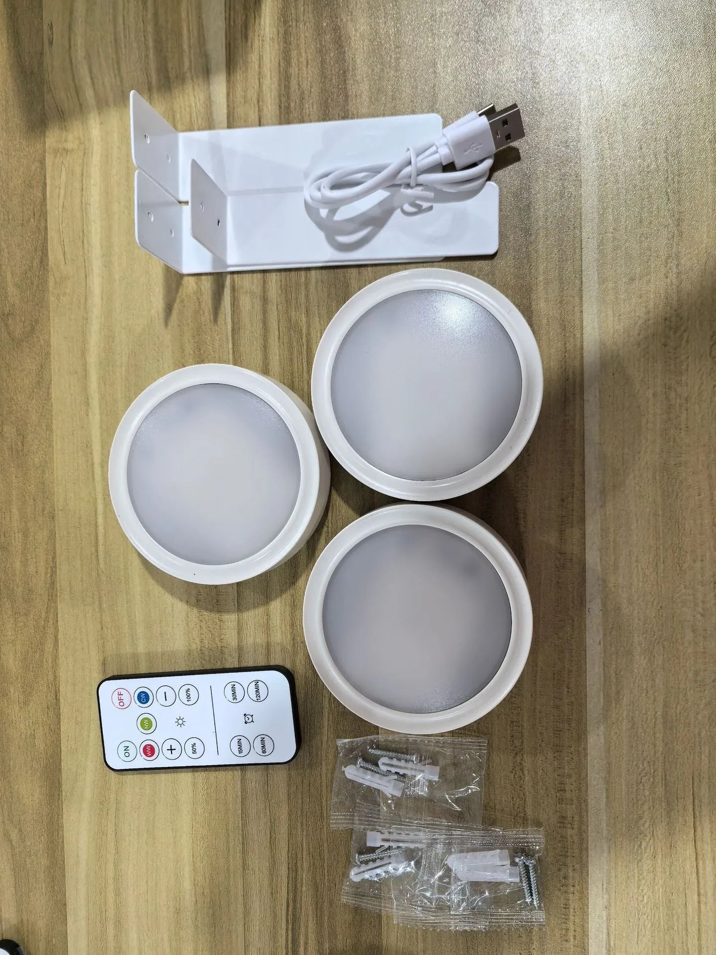 Wireless LED painting lamp with magnetic charging and remote control in black, white or gold finish