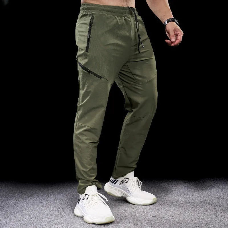 Men's waterproof quick-drying workout trousers in nylon fabric available in multiple colours and sizes