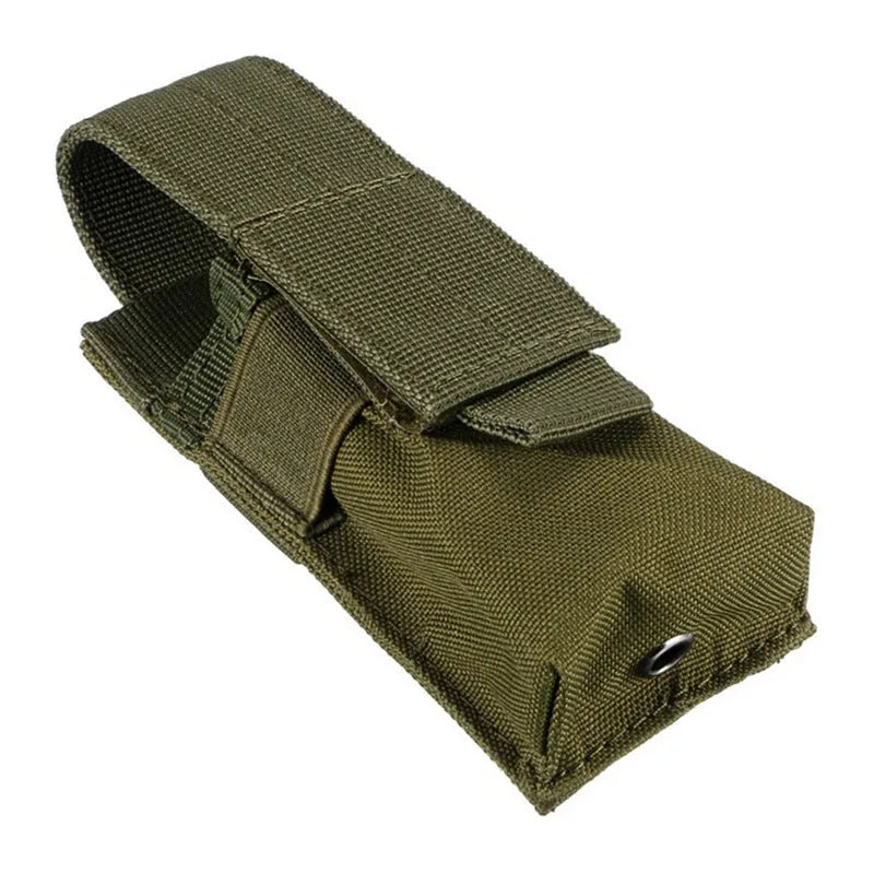 Black tactical MOLLE waist bag with elastic cord buckle, shown next to a small flashlight