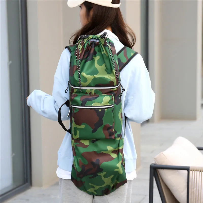 Waterproof nylon skateboard carry bag with 20-35 litre capacity in black camouflage colours