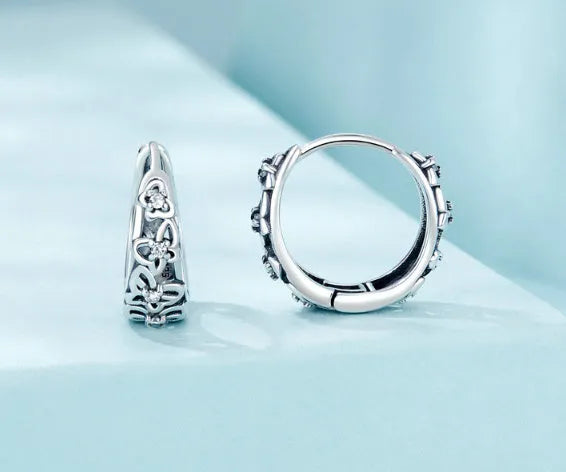 Sterling silver hollow butterfly earrings with zircon stones measuring 14mm by 5mm