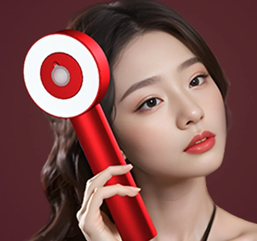 Black handheld LED light massage hair comb with red and blue lights, Type-C charging port visible.