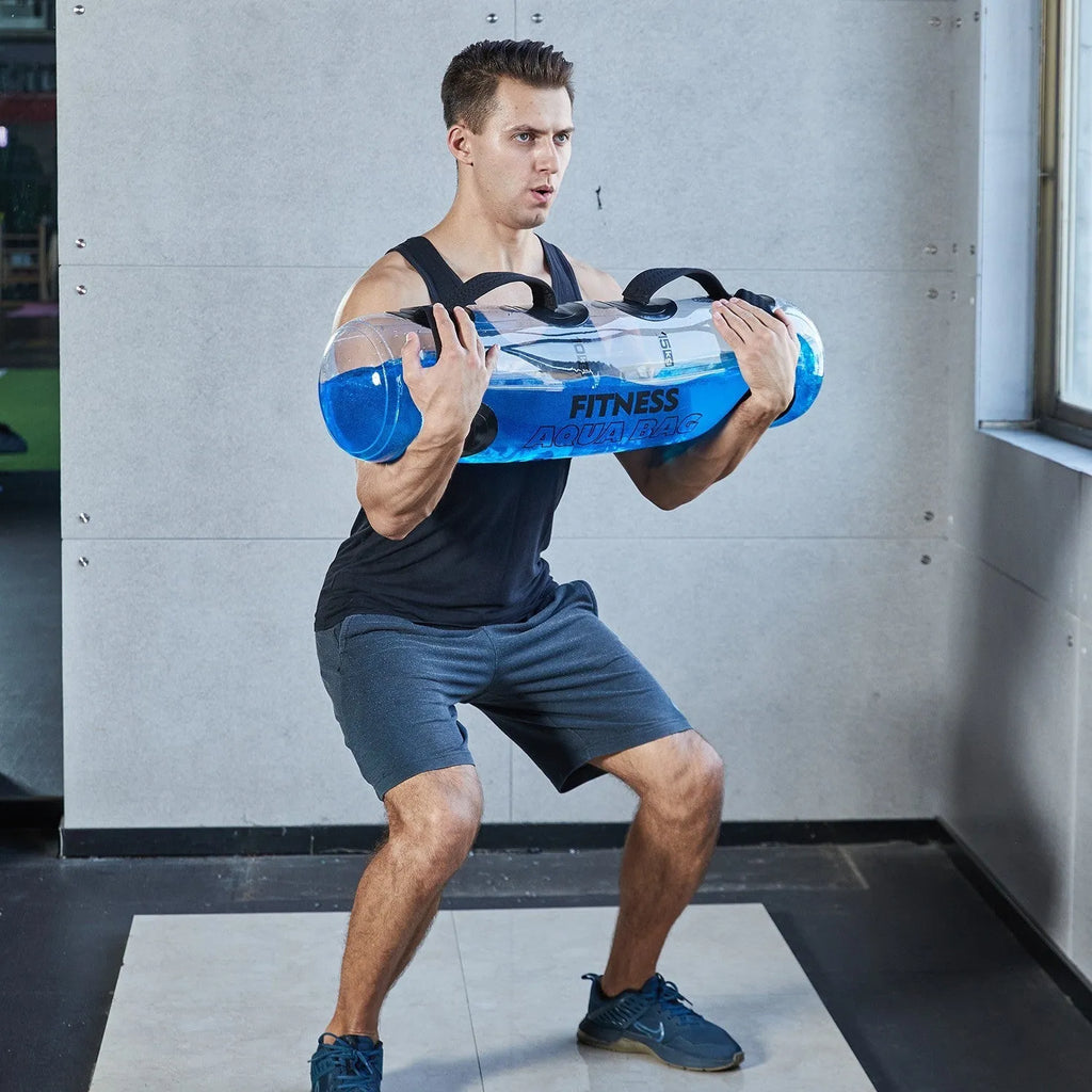 Transparent PVC inflatable weight lifting bag filled with water, showing weight scale options from 5kg to 35kg.