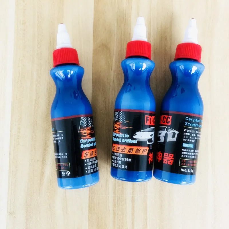 Small blue bottle of 30ml car scratch repair agent with applicator brush for automotive paint touch-ups