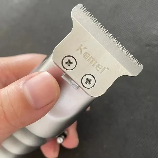 Barber scissors with LCD display and stainless steel engraving tool head on rechargeable base