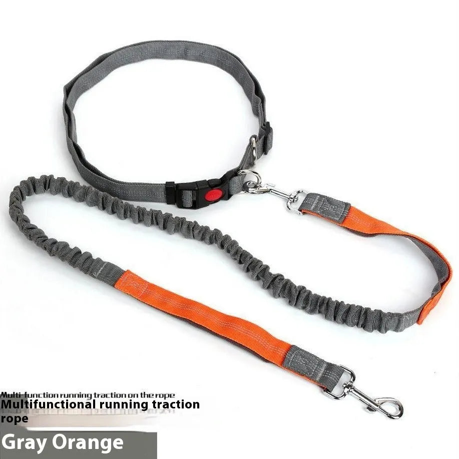 Grey and green reflective dog leash with elastic section shown on a table.