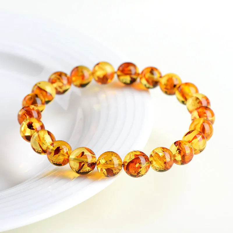 Natural yellow piebald amber bracelet with geometric beads in three size options