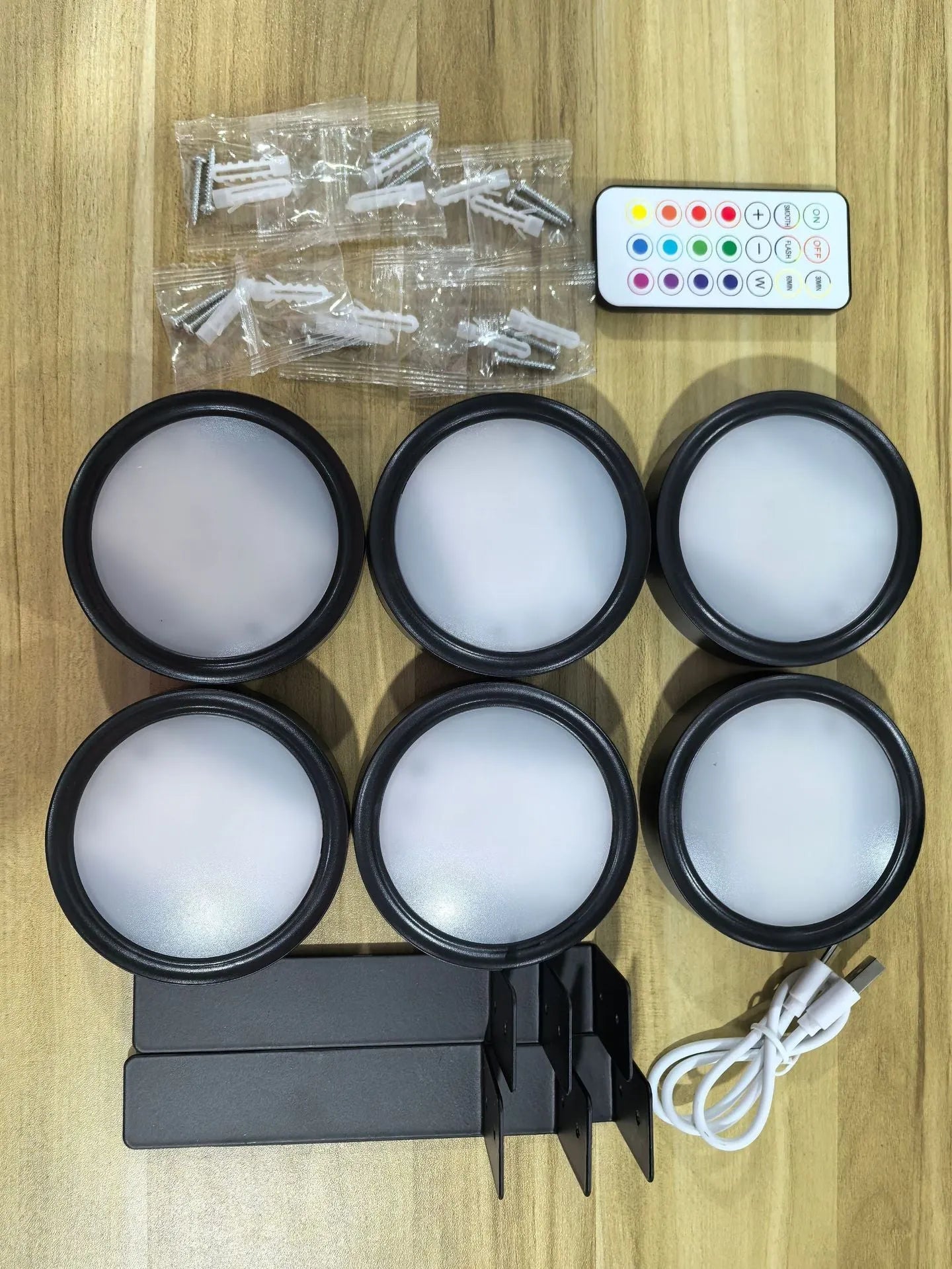 Wireless LED painting lamp with magnetic charging and remote control in black, white or gold finish