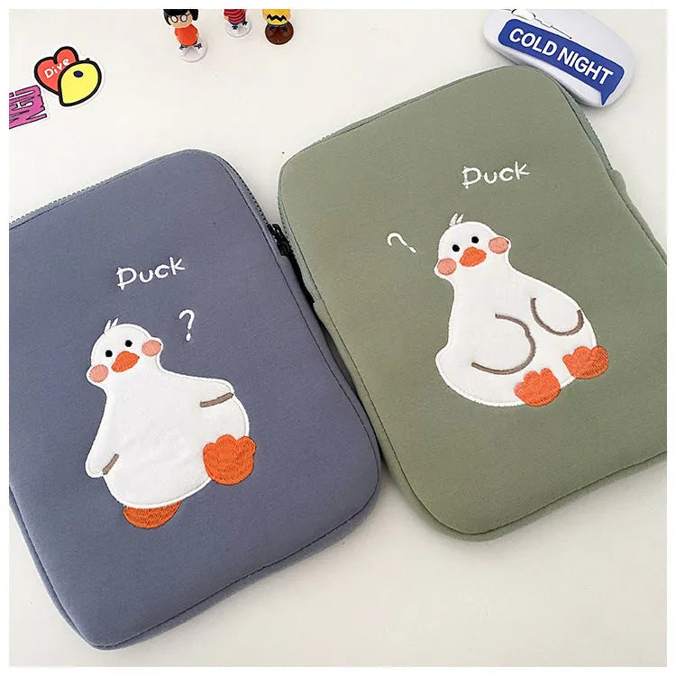 Blue tablet case with cartoon duck embroidery design and zipper closure