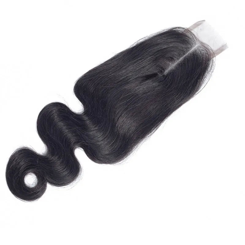 Straight natural colour human hair wig on a stand, showing hand-woven cap and long length.