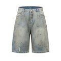 Blue washed denim cropped middle pants with straight leg and zipper fly on a model.