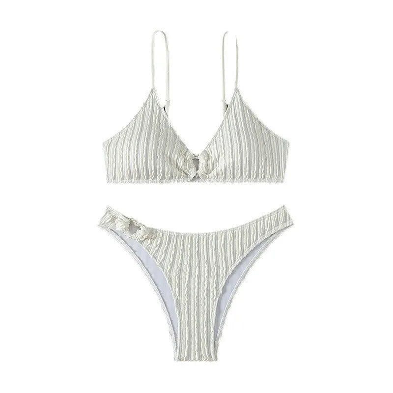 White women's V-neck swimsuit with split leg design and two-piece construction