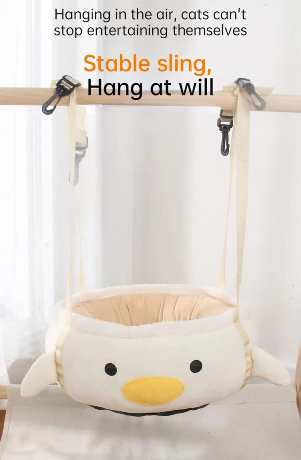 Green dinosaur-shaped cat bed with hanging straps that can be used flat or as a hammock