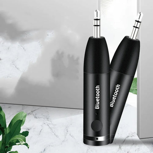 Black Bluetooth audio receiver with AUX cable for car stereo wireless music streaming