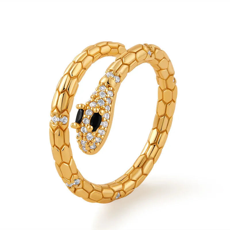 Adjustable snake-shaped copper ring with 18K gold colour plating on index finger