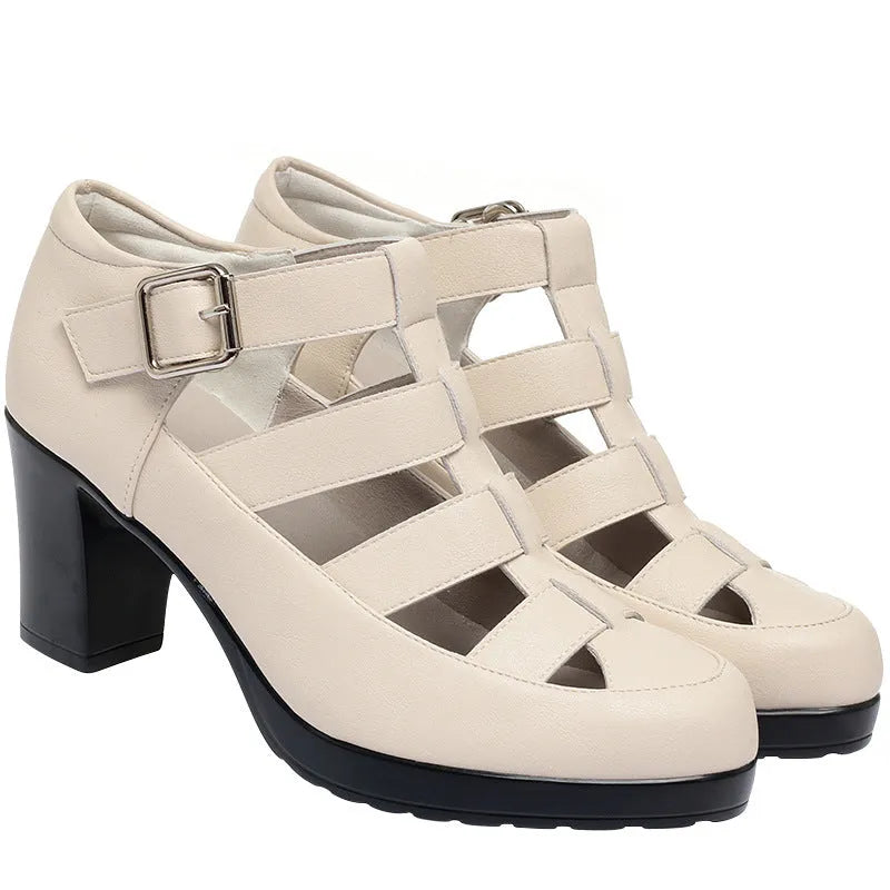 Women's beige closed toe sandals with a chunky heel, woven upper, ankle strap buckle, and back zipper.
