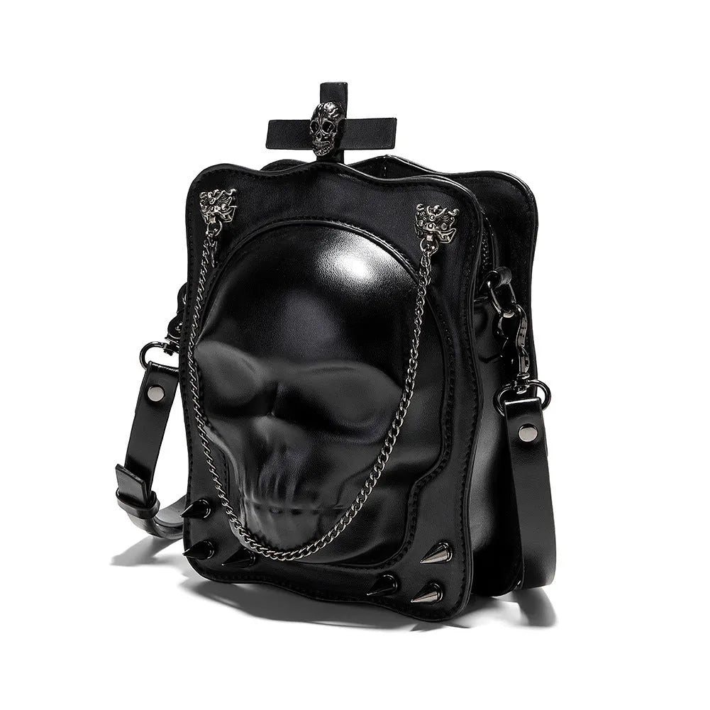 Black gothic skull crossbody bag with square shape, stitching and metal rivet detailing