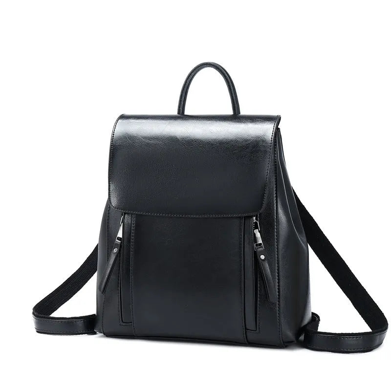 Large genuine leather women's backpack in black with internal organiser pockets and double straps