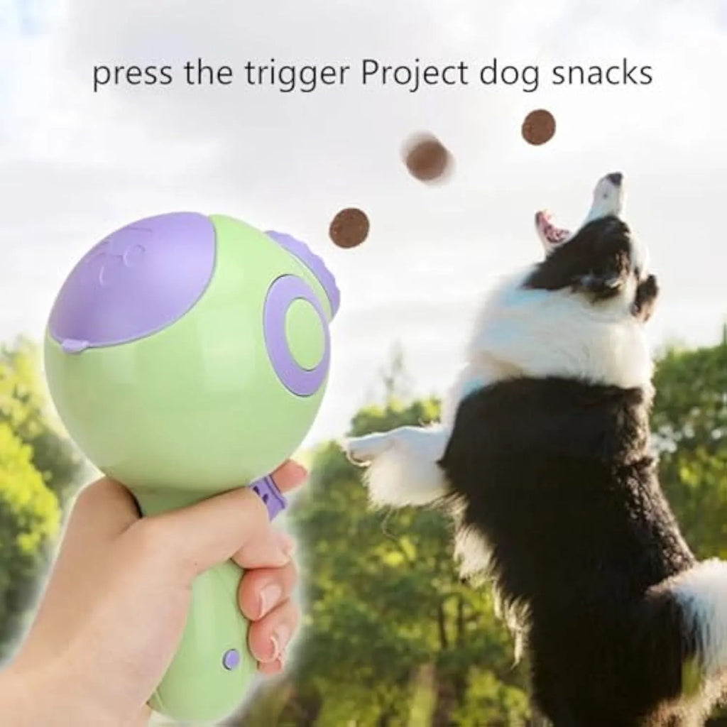 Dog treat launcher toy in green, orange, or pink colours measuring 15.5 x 9 x 8.5 cm
