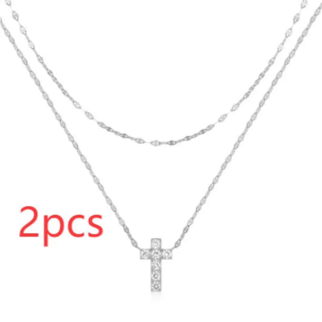 S925 sterling silver double layer twin diamond cross pendant on a clavicle chain.