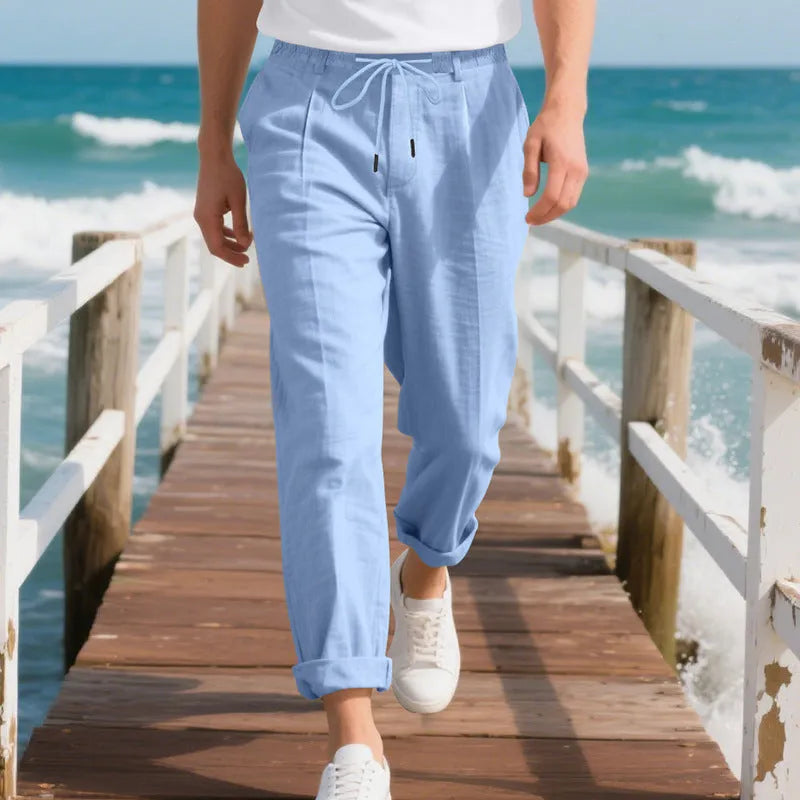 Men's light khaki linen casual trousers with a loose straight-leg fit and drawstring waist.