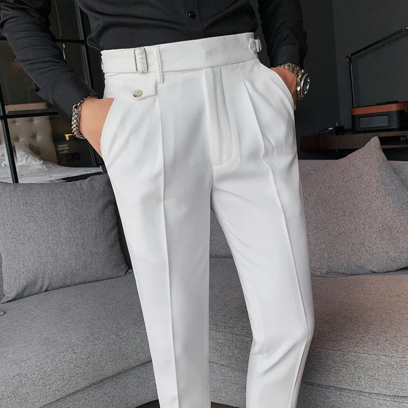 Straight-leg casual trousers in solid colours including black, grey, and khaki on a neutral background.