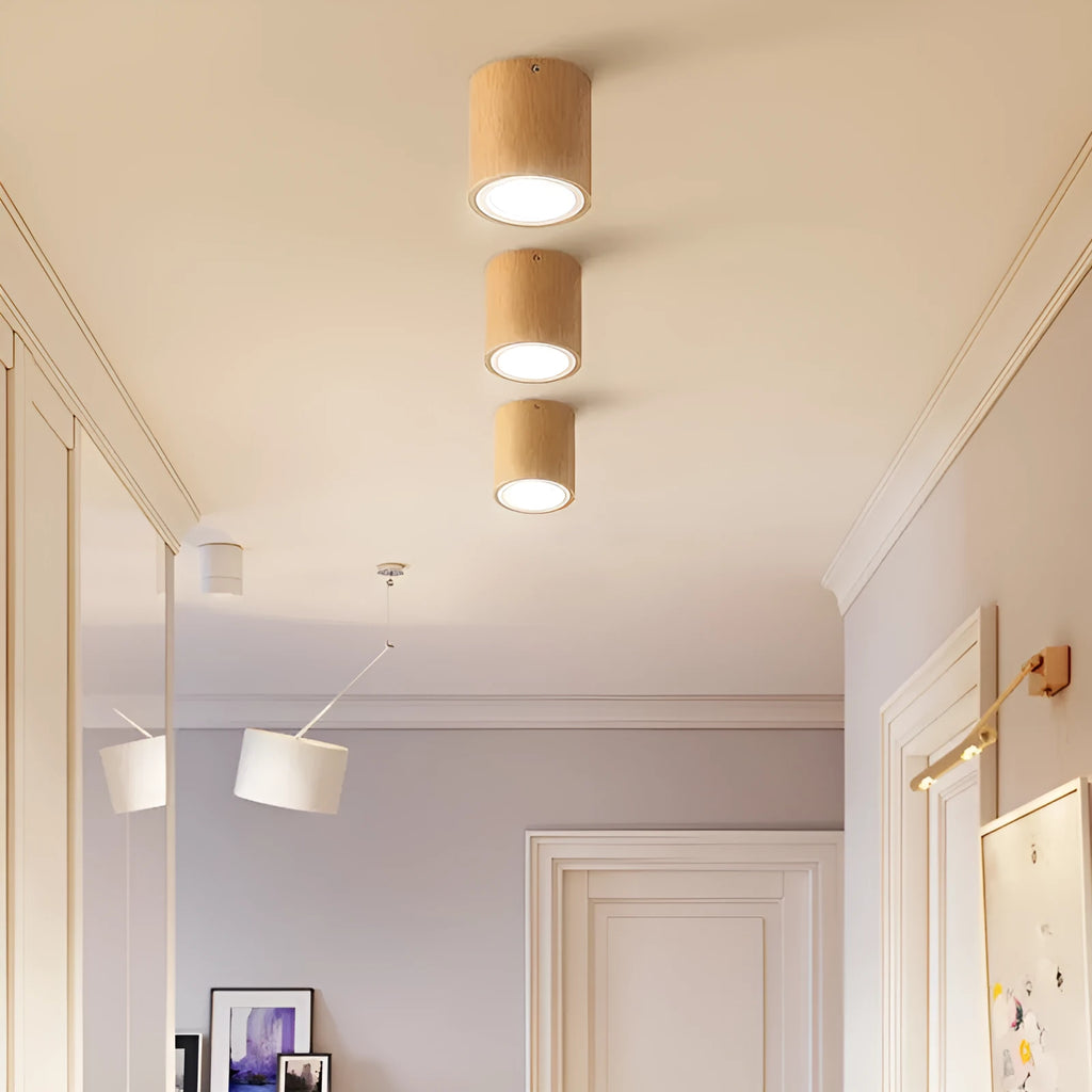 Solid wood surface mounted downlight in wood colour with square or round design options