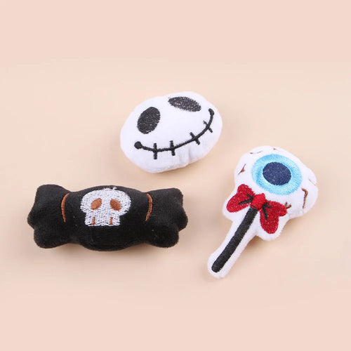 Colourful plush cat teaser wand with candy, eyes and skull animal shapes for interactive play