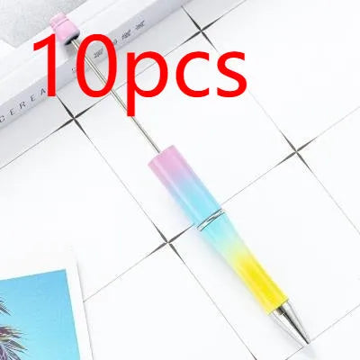 Creative ballpoint pen with multicoloured spinning plastic beads on a steel wire frame.