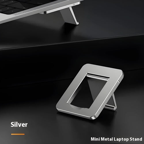 Foldable aluminum laptop bracket showing silver alloy construction and 3M adhesive backing
