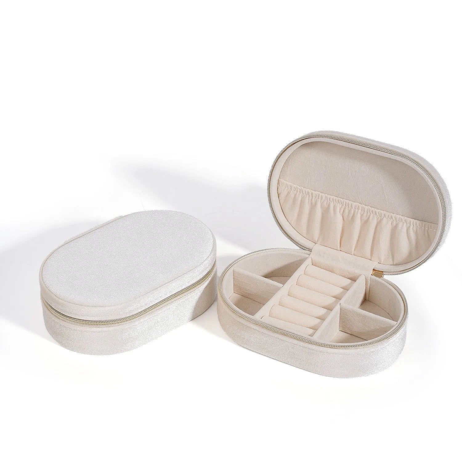 Oval velvet jewellery storage box in lake blue colour with flannel-lined interior compartments