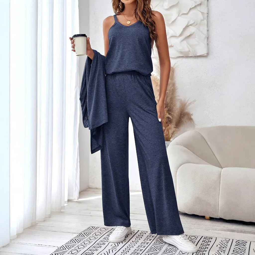 Blue three-piece women's suit set with long sleeve top and trousers in solid color