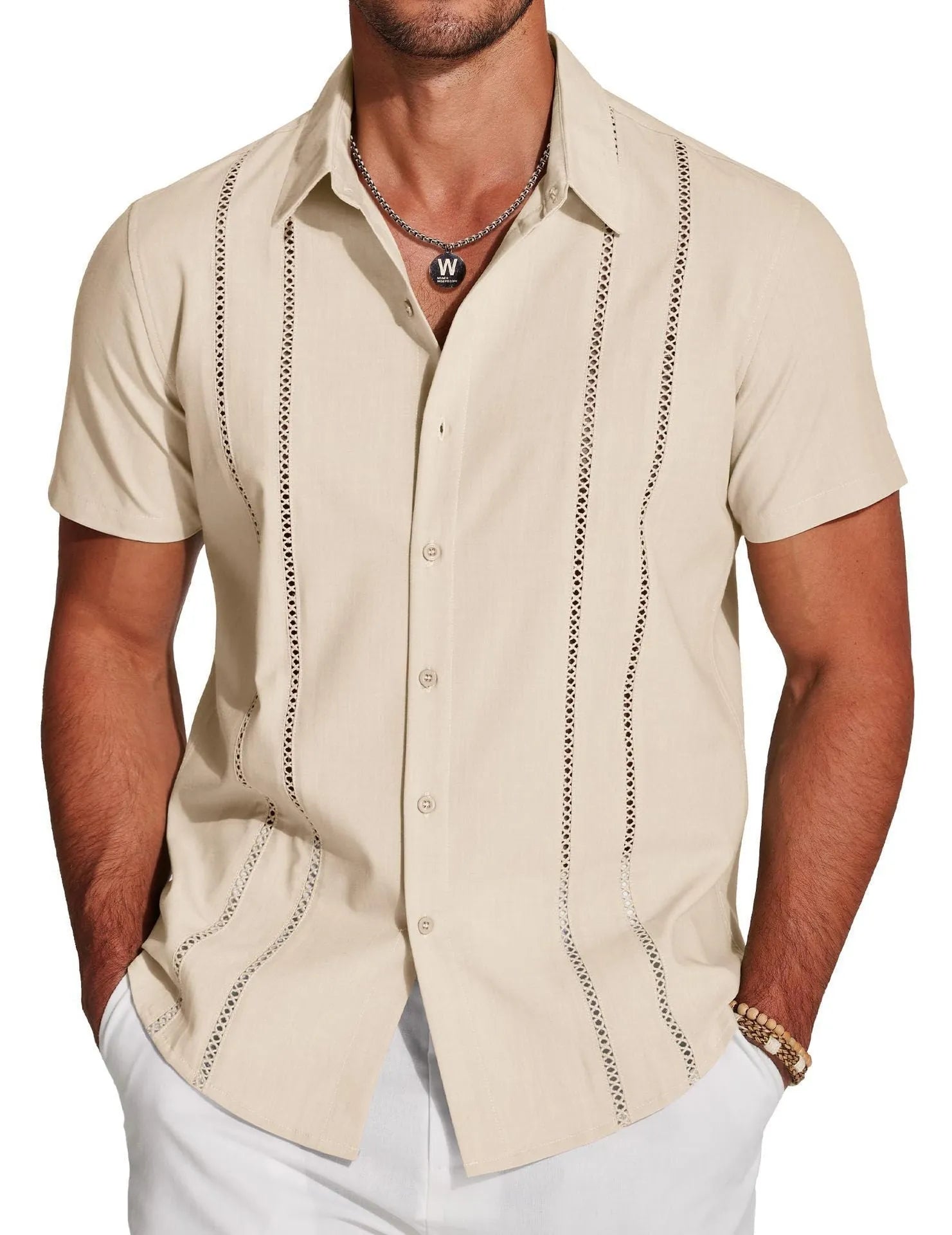 Man wearing a slim fit, short sleeve Hawaiian shirt with a colourful digital print pattern.