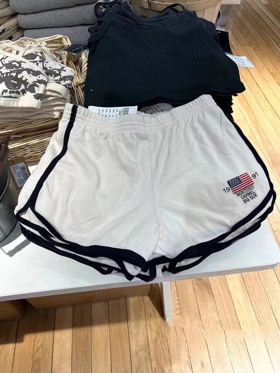 Women's dark blue cotton sports shorts with embroidered white flag design and free size fitting