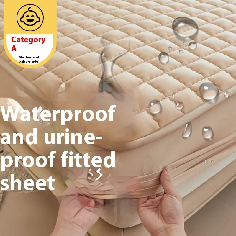 Blue washed cotton waterproof fitted sheet with elasticated corners shown on mattress