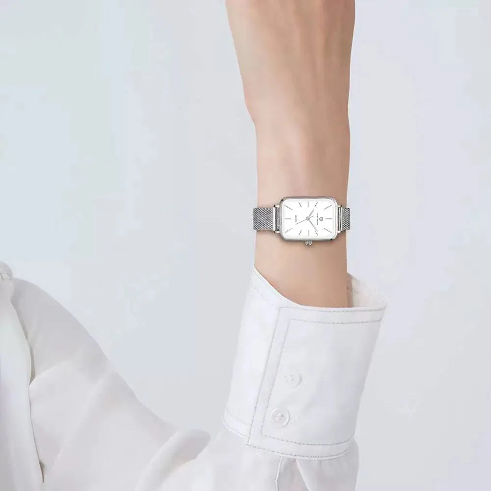 Women's rose gold waterproof quartz watch with woven steel strap and 34mm alloy case