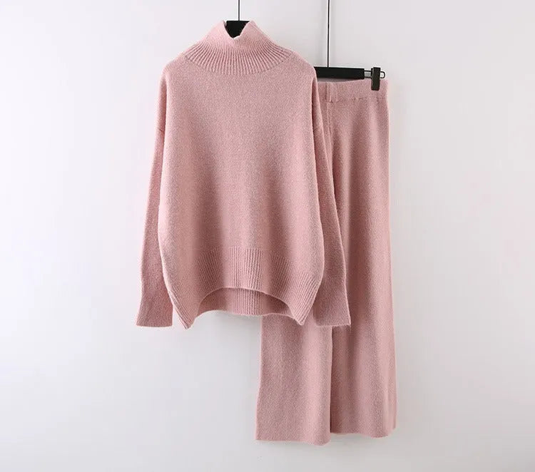 Women's solid colour sweater and wide leg trousers two-piece set in beige, shown as a coordinated outfit.
